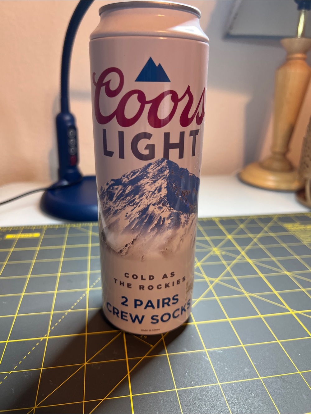 Coors Light Limited Edition Can with 2 pairs of men’s crew socks inside